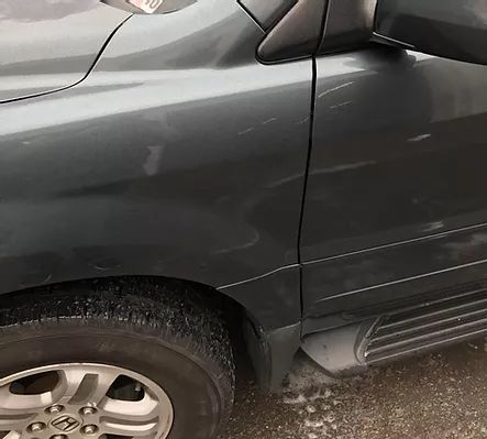 Before and after: rear door repair