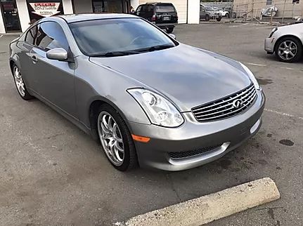 Silver coupe after collision repair